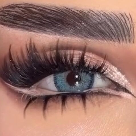 Hypnose Blue-tinted lenses on dark brown eyes 
