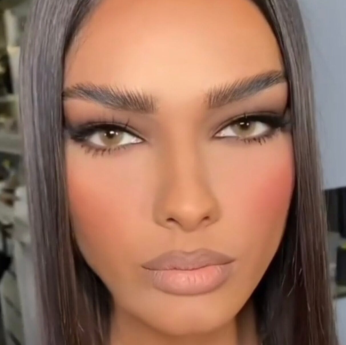 Medeo Hazel-colored contact lenses on dark brown eyes 