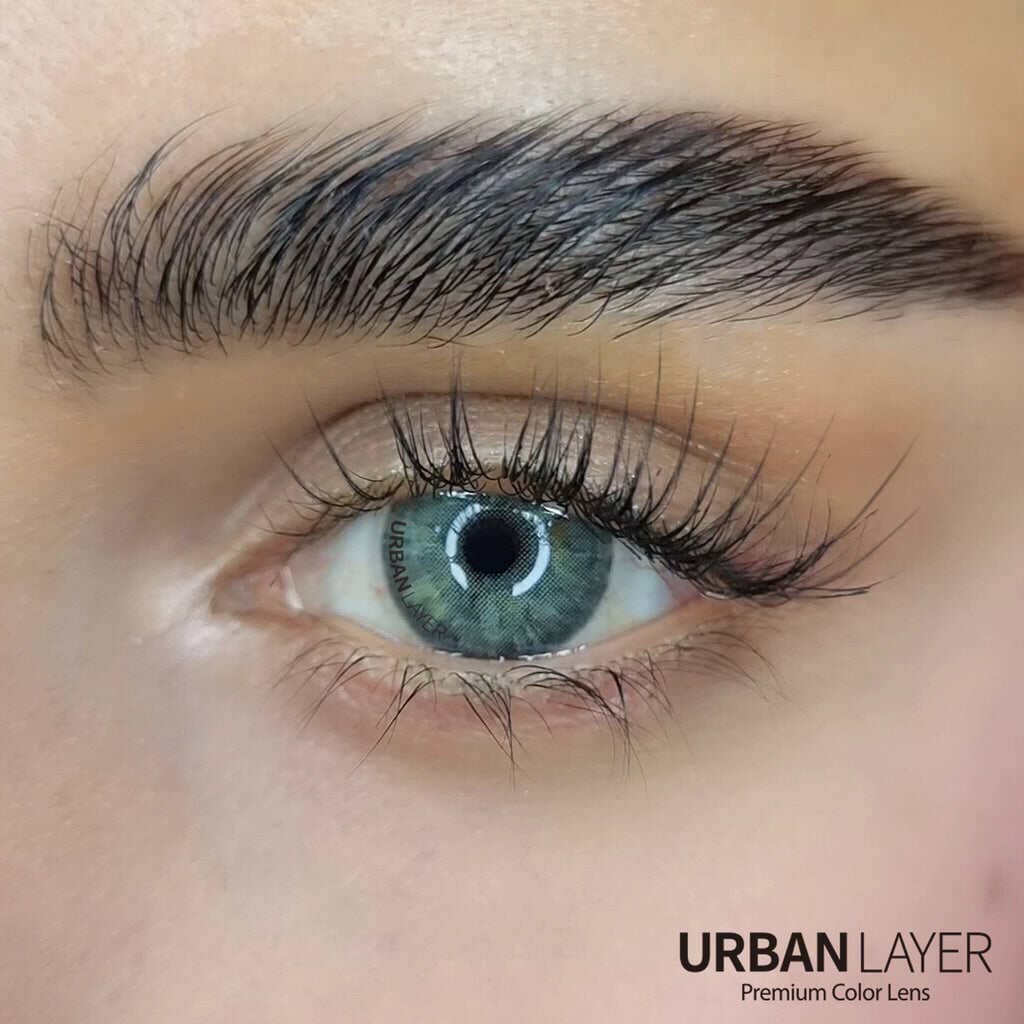 Grey colored lenses on dark brown eyes