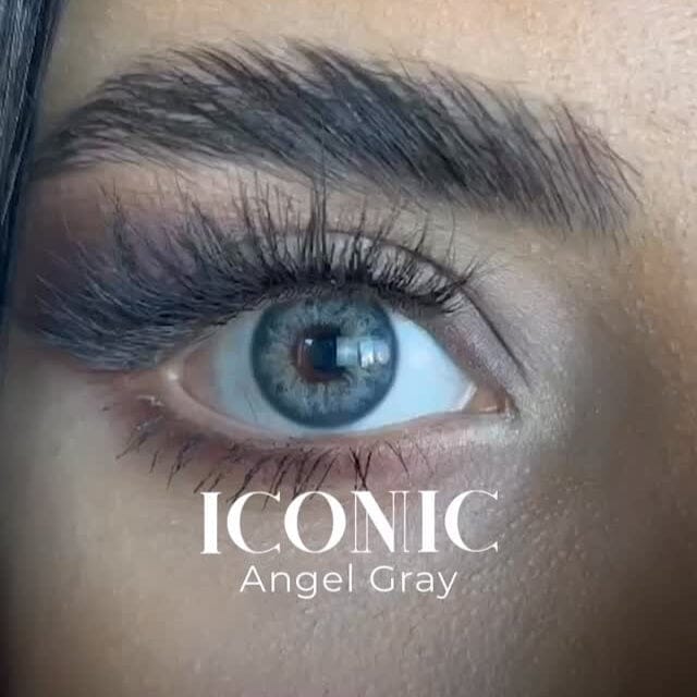 Grey blue colored lenses on dark brown eyes 