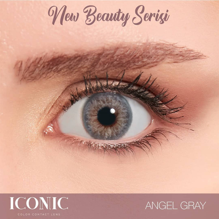 Grey blue colored lenses on dark brown eyes 