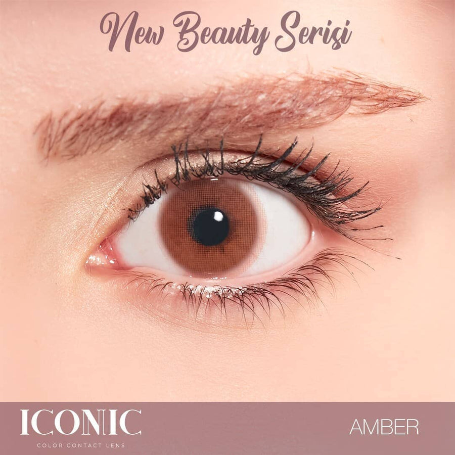 Hazel Amber colored lenses on dark brown eyes